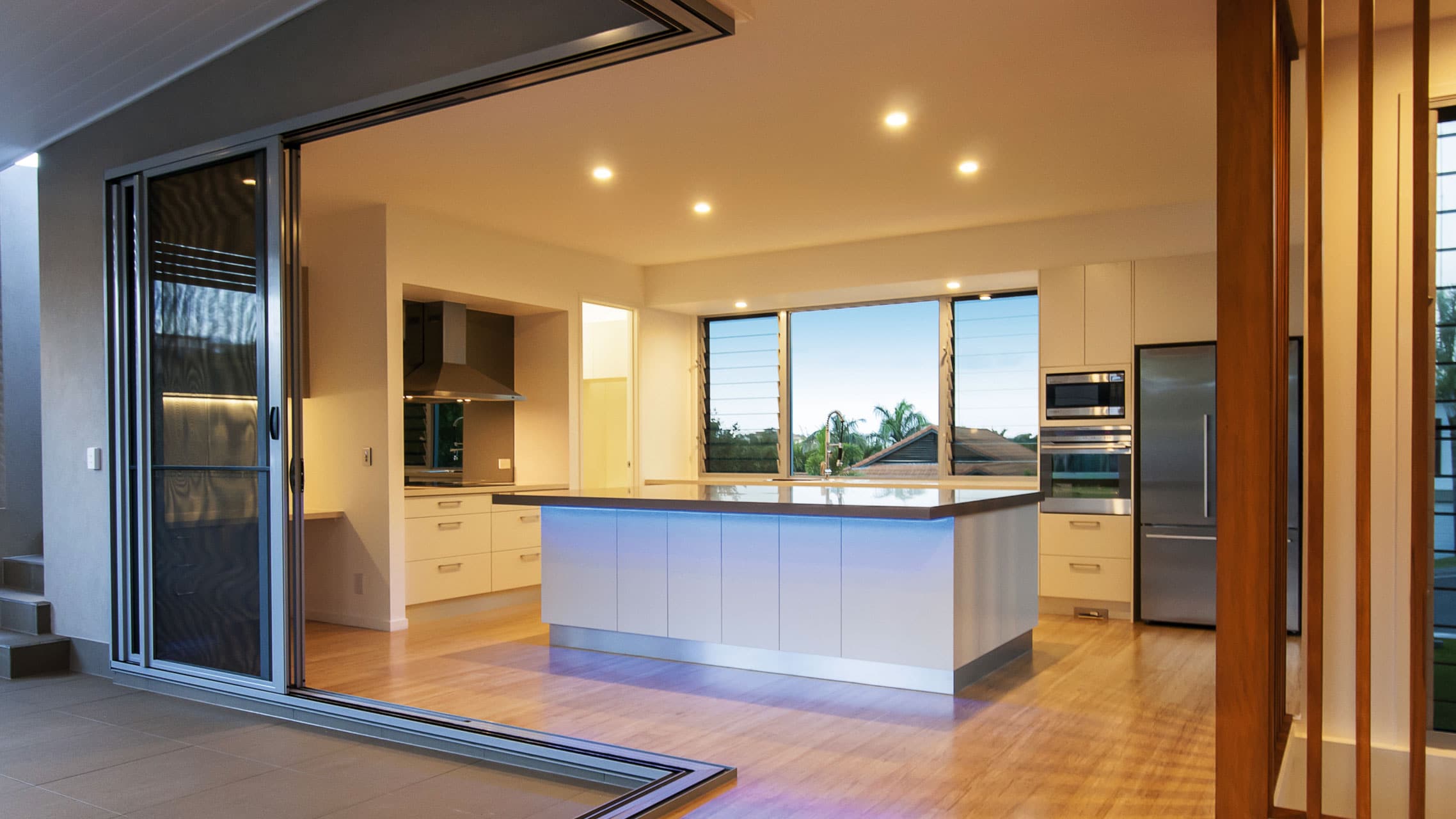 Aluminium Corner Sliding Doors in a kitchen