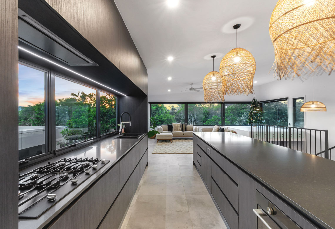 Black Aluminium Awning Windows used as a splashback window