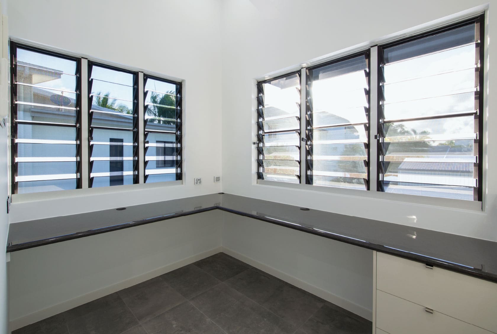 Louvre Windows with glass blades in the study