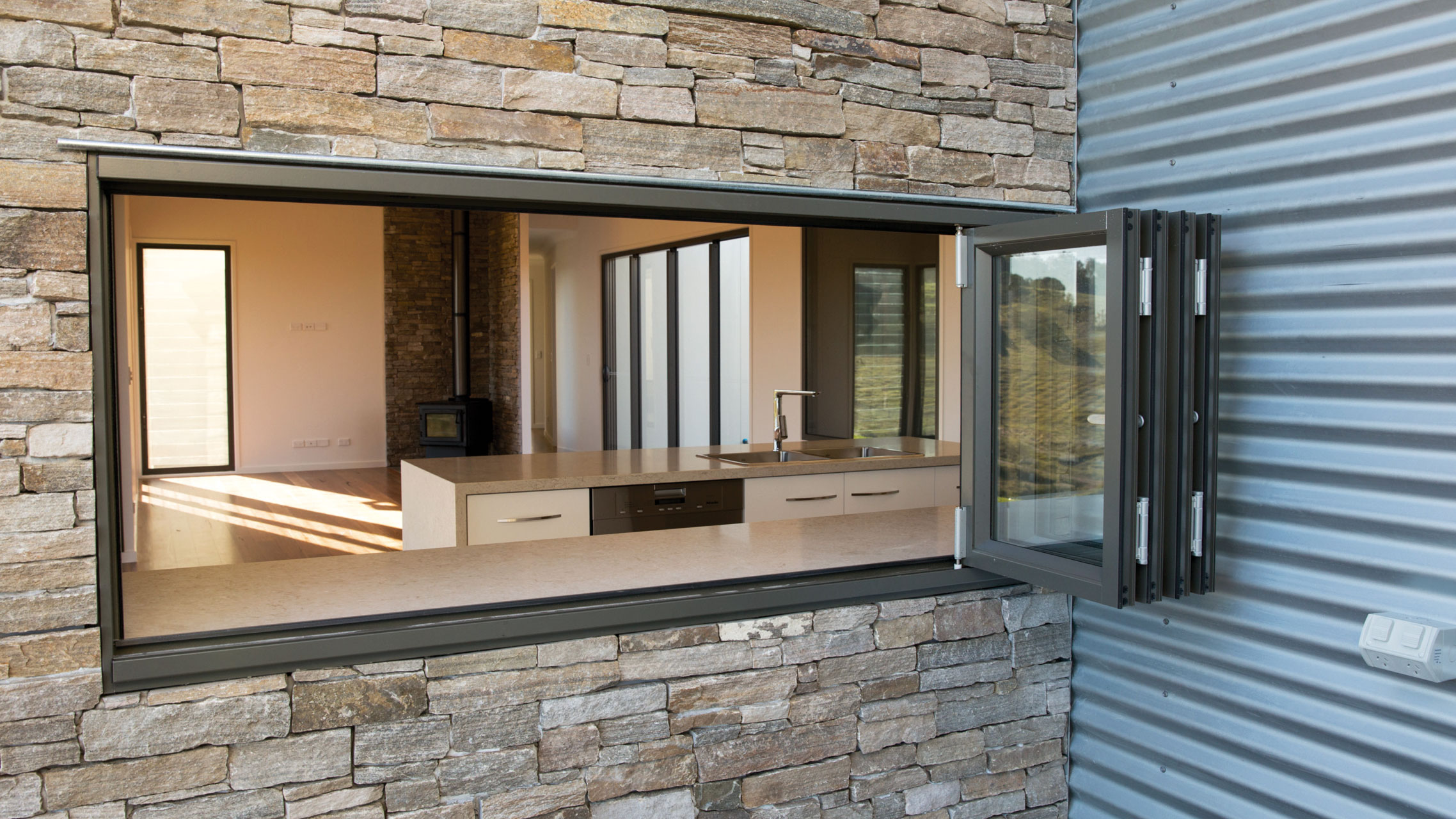 Premium Window - Aluminium Bi fold Windows in a kitchen