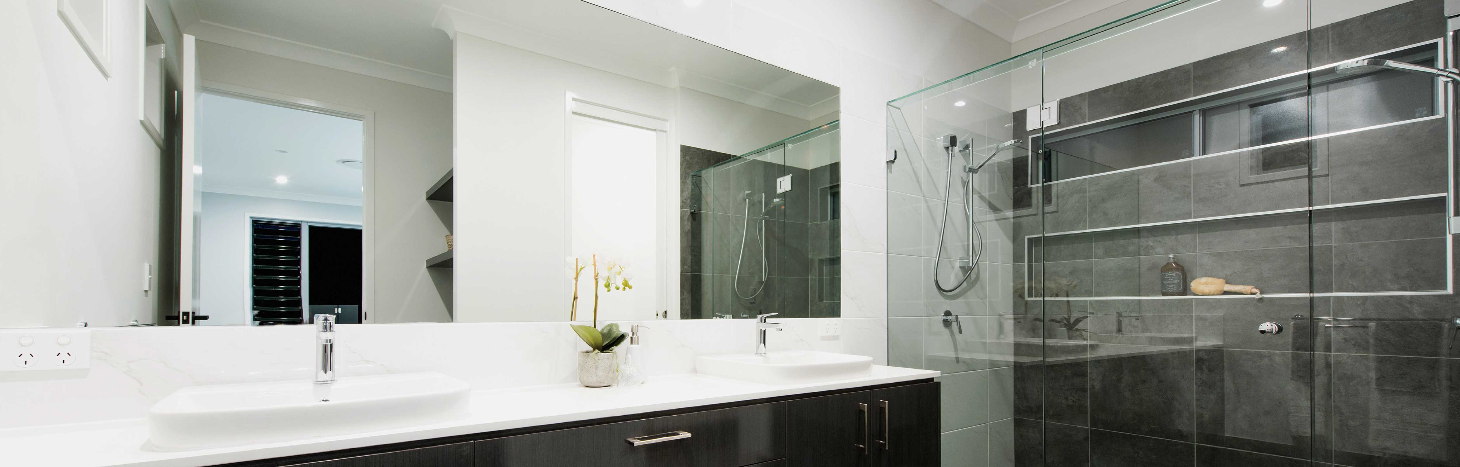 Large Frameless Mirror in a bathroom