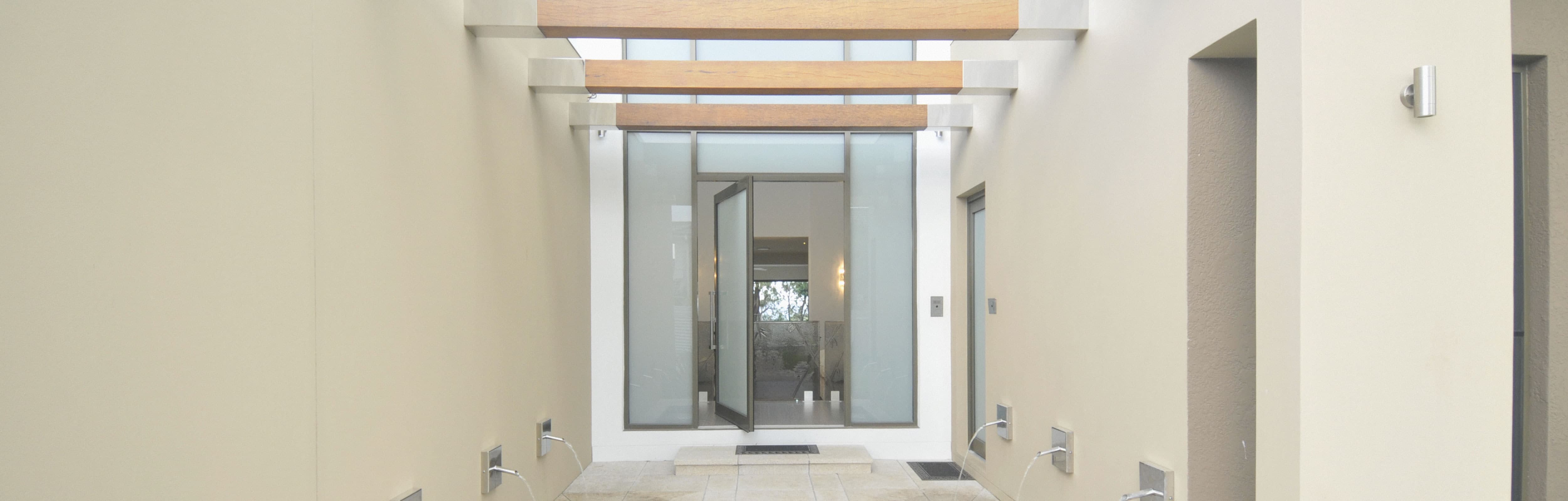 Black Aluminium Pivot Door with obscure glass