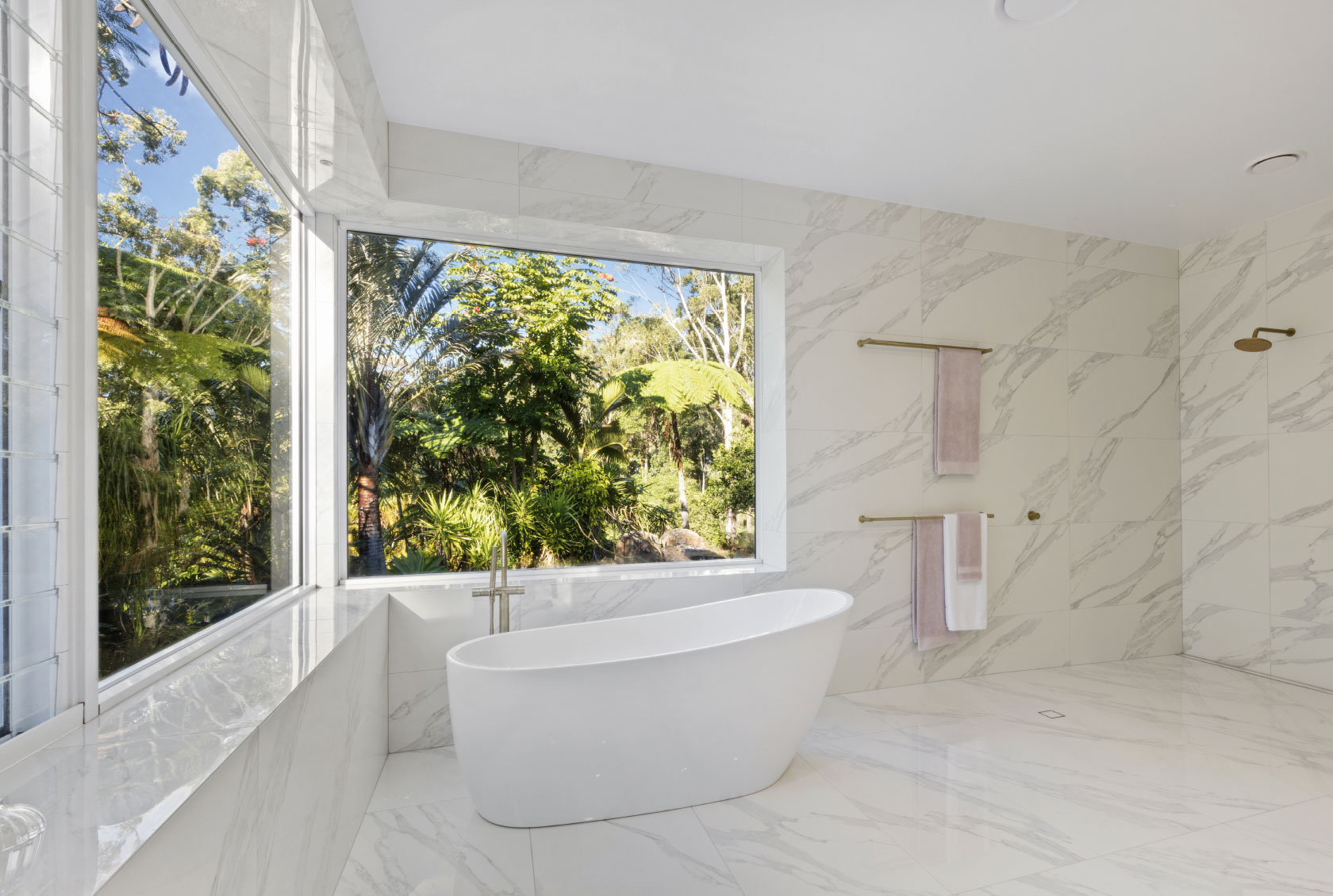 Two Large Fixed Windows in a bathroom