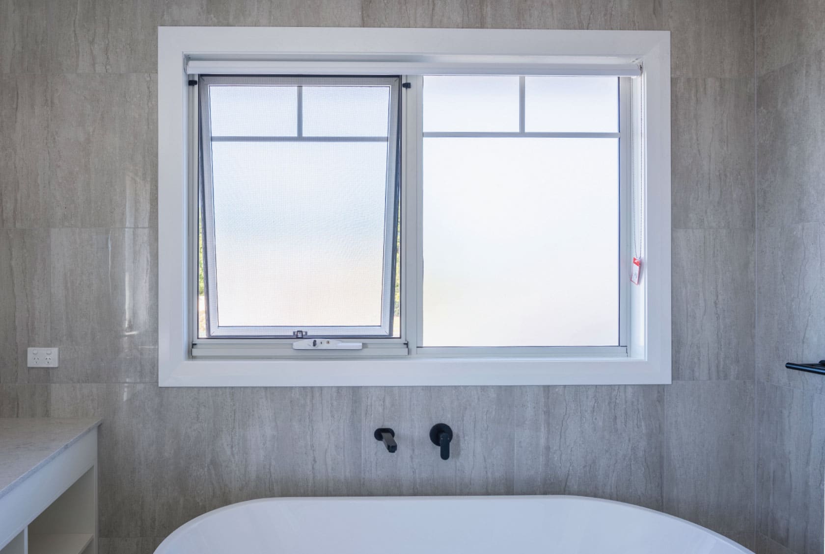 White Awning Window in a bathroom