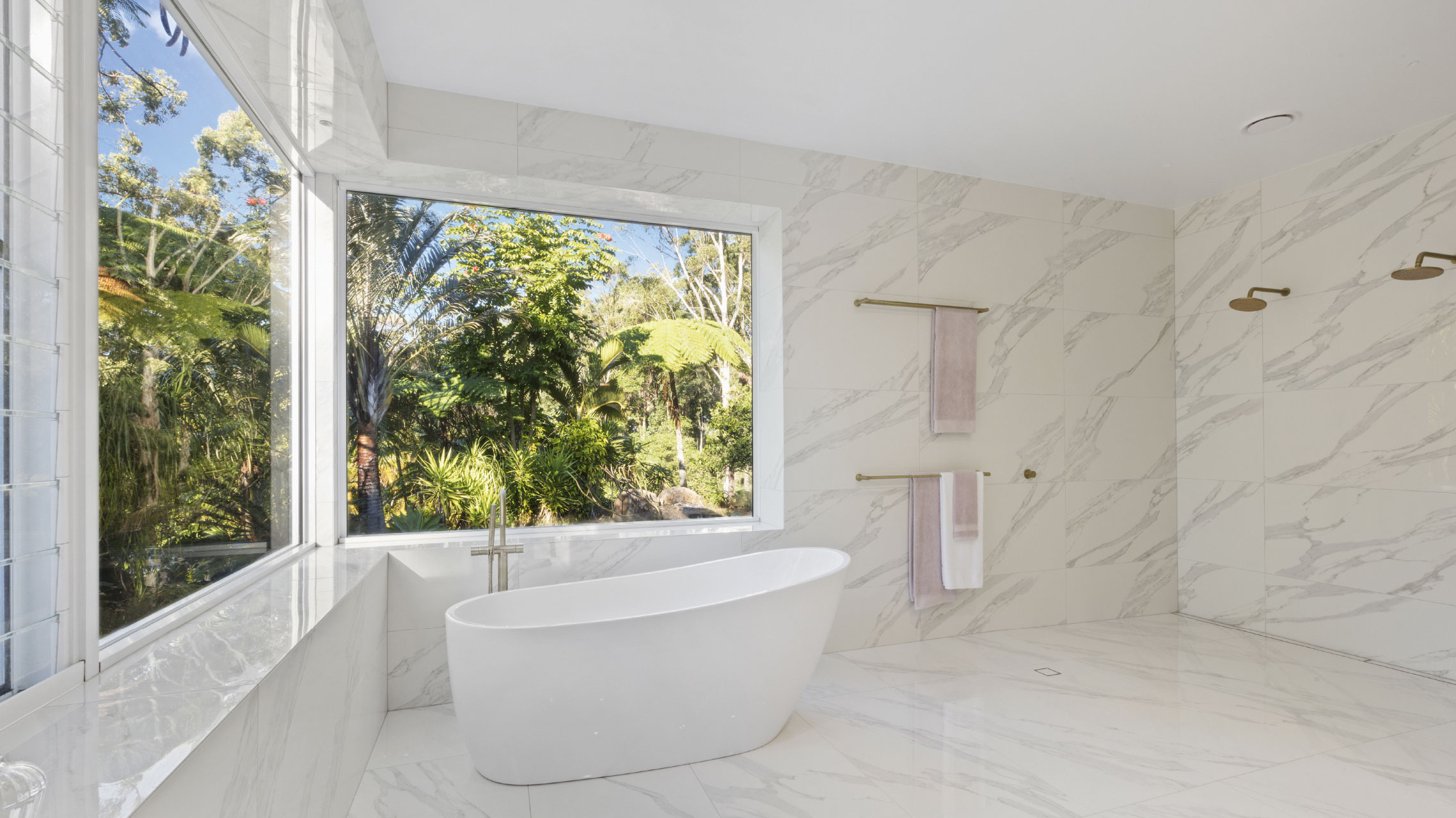 Two Large Fixed Windows in a bathroom