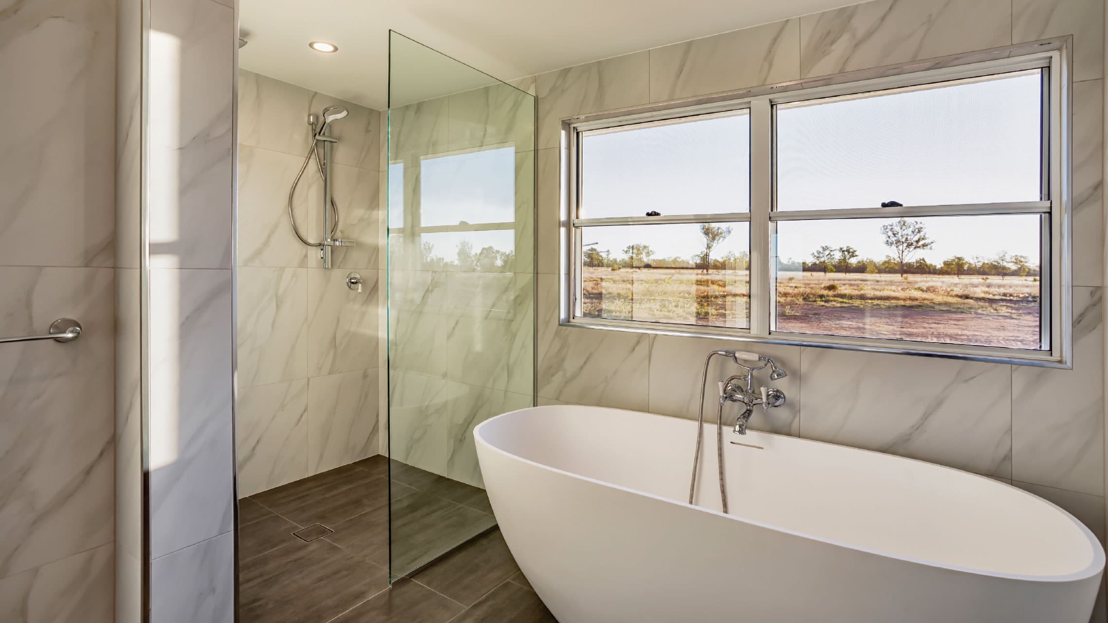 White Sash Window above a bathtub