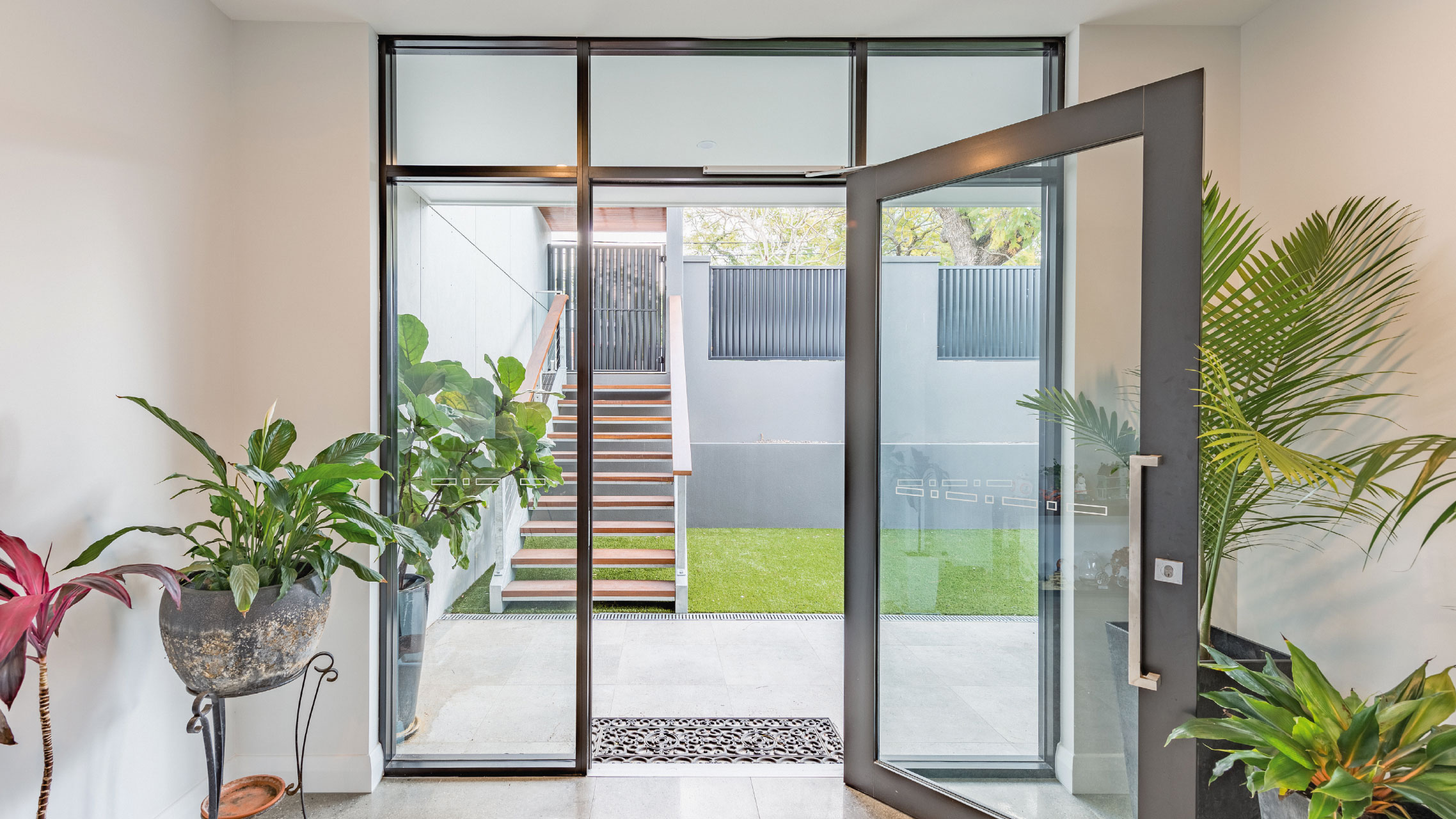 Large French Door with fixed window above and on both sides