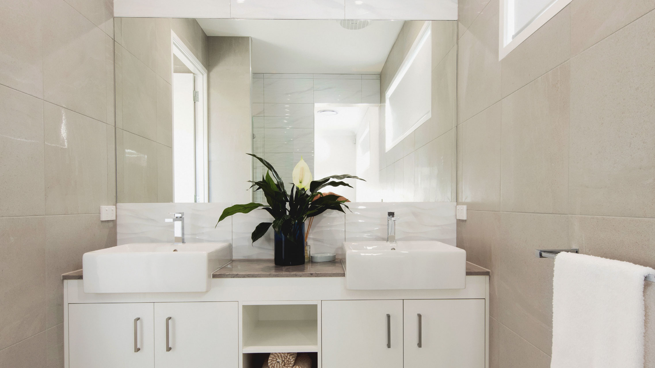 Semi-frameless Bathroom Mirror above a vanity