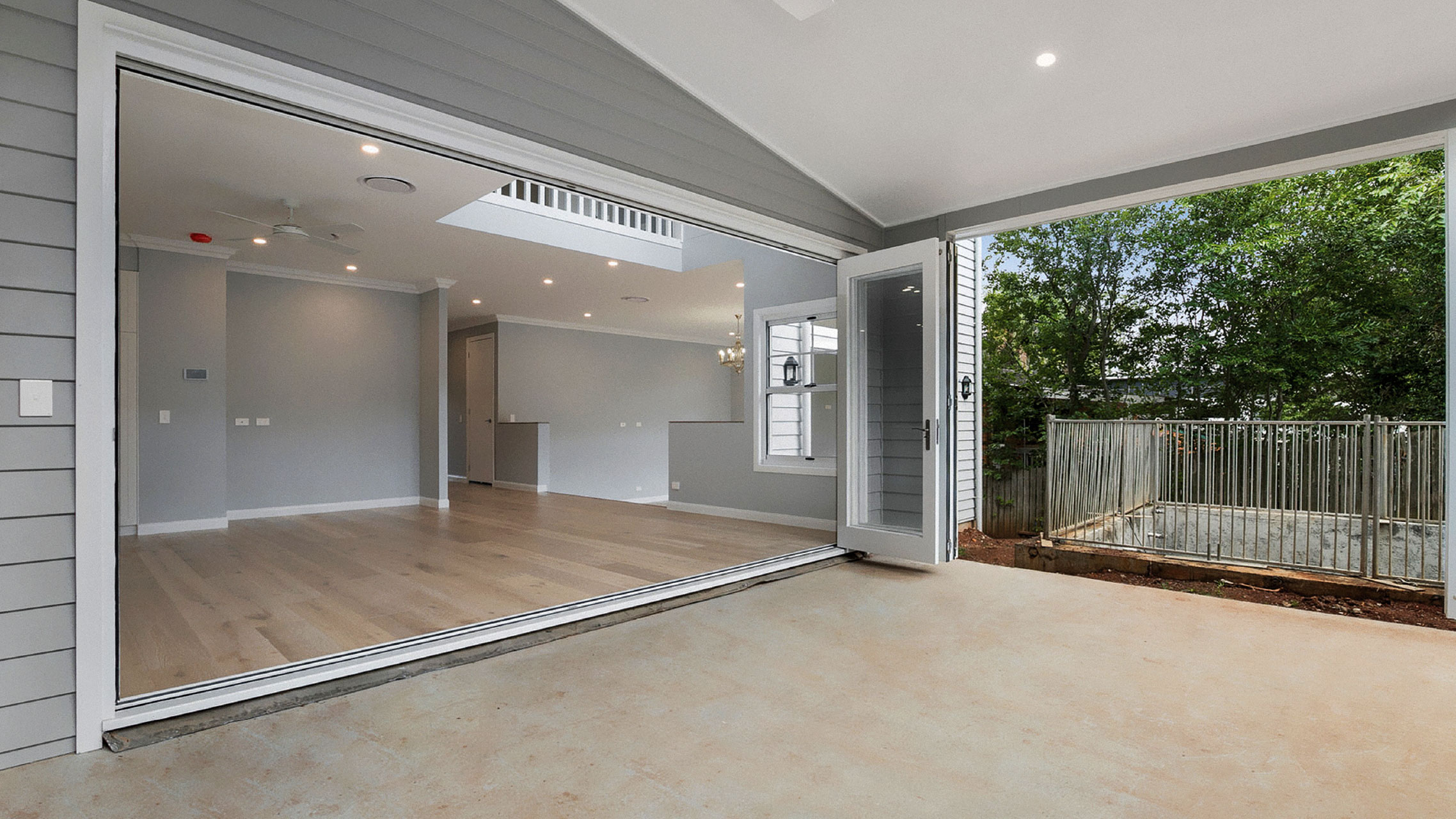 White Aluminium Bifold Door fully opened