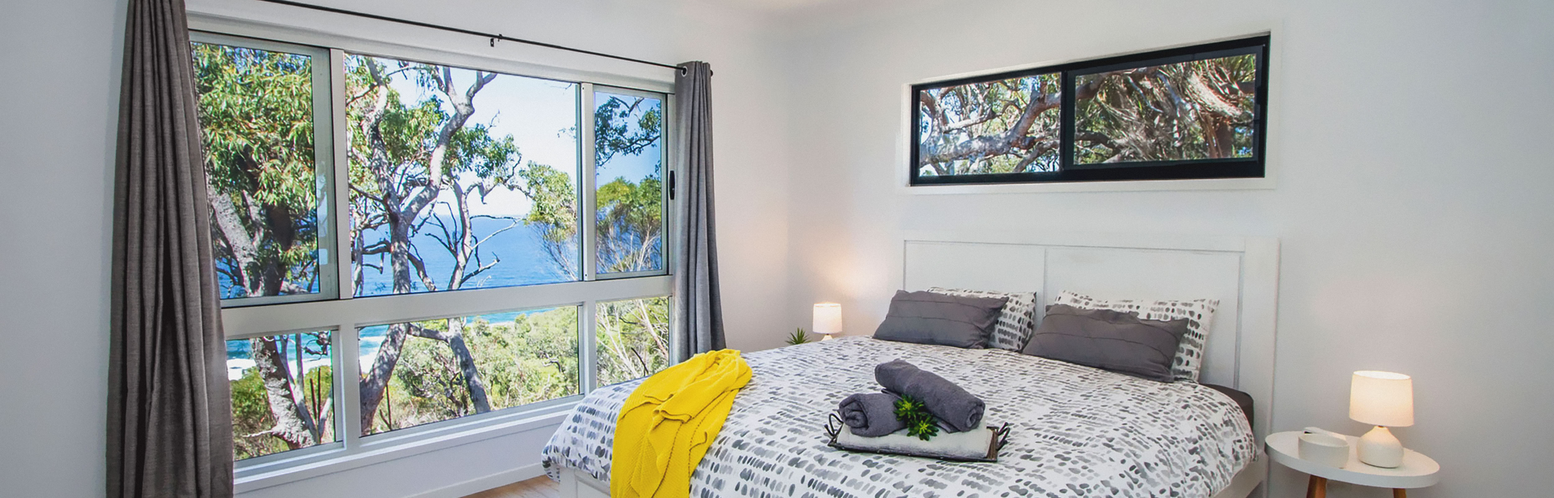 White and Black Sliding Windows in bedroom