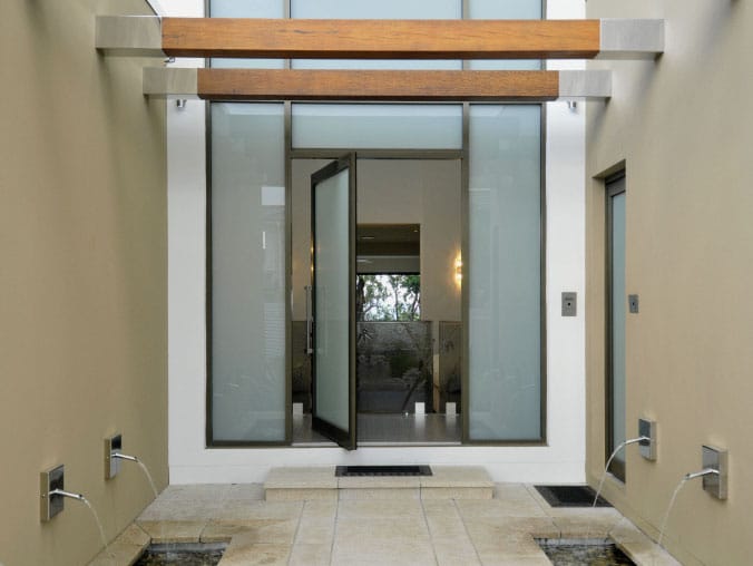 black pivot door with privacy glass