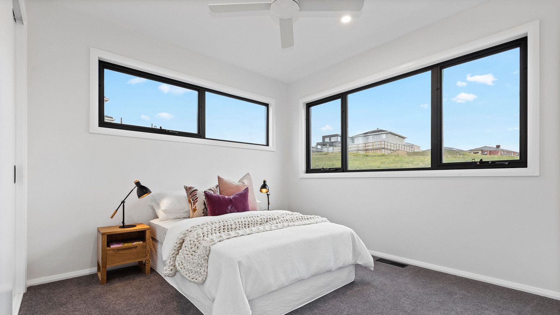 Bedroom with awning and fixed windows