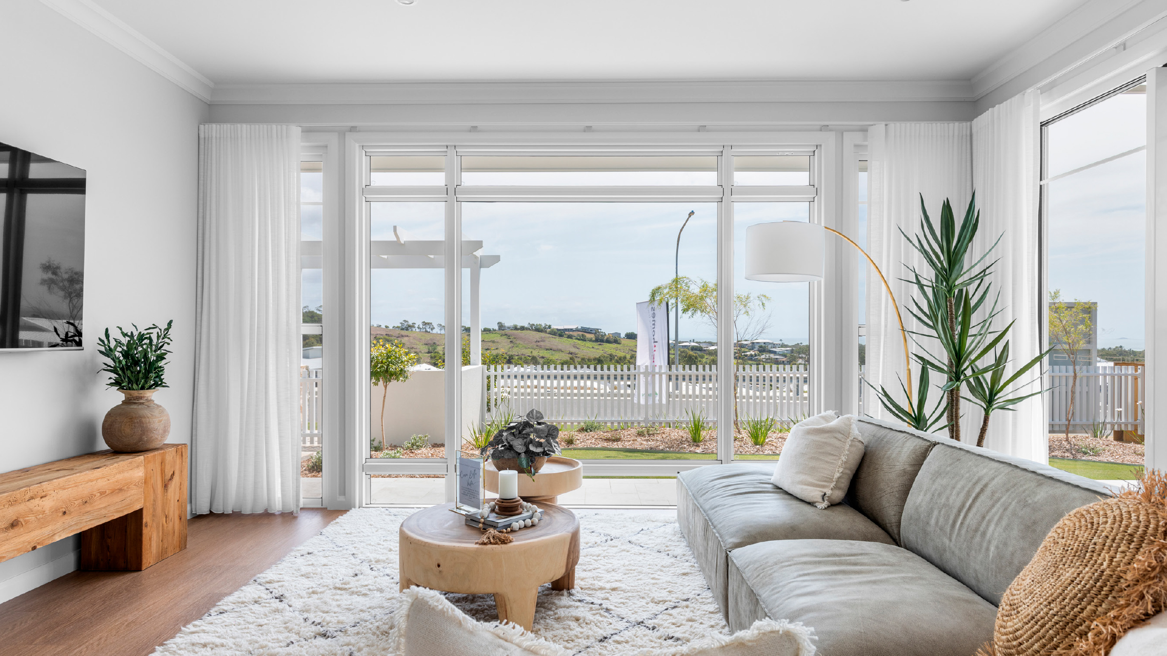 Large White Patio Fixed Window next to double hung windows