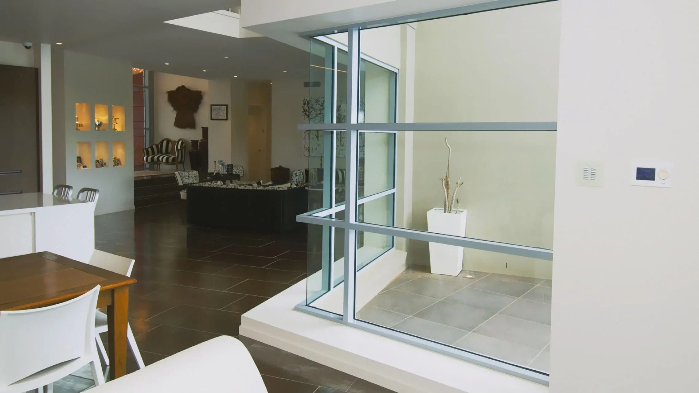 Ultra Silver Aluminium Commercial Fixed Windows in a house