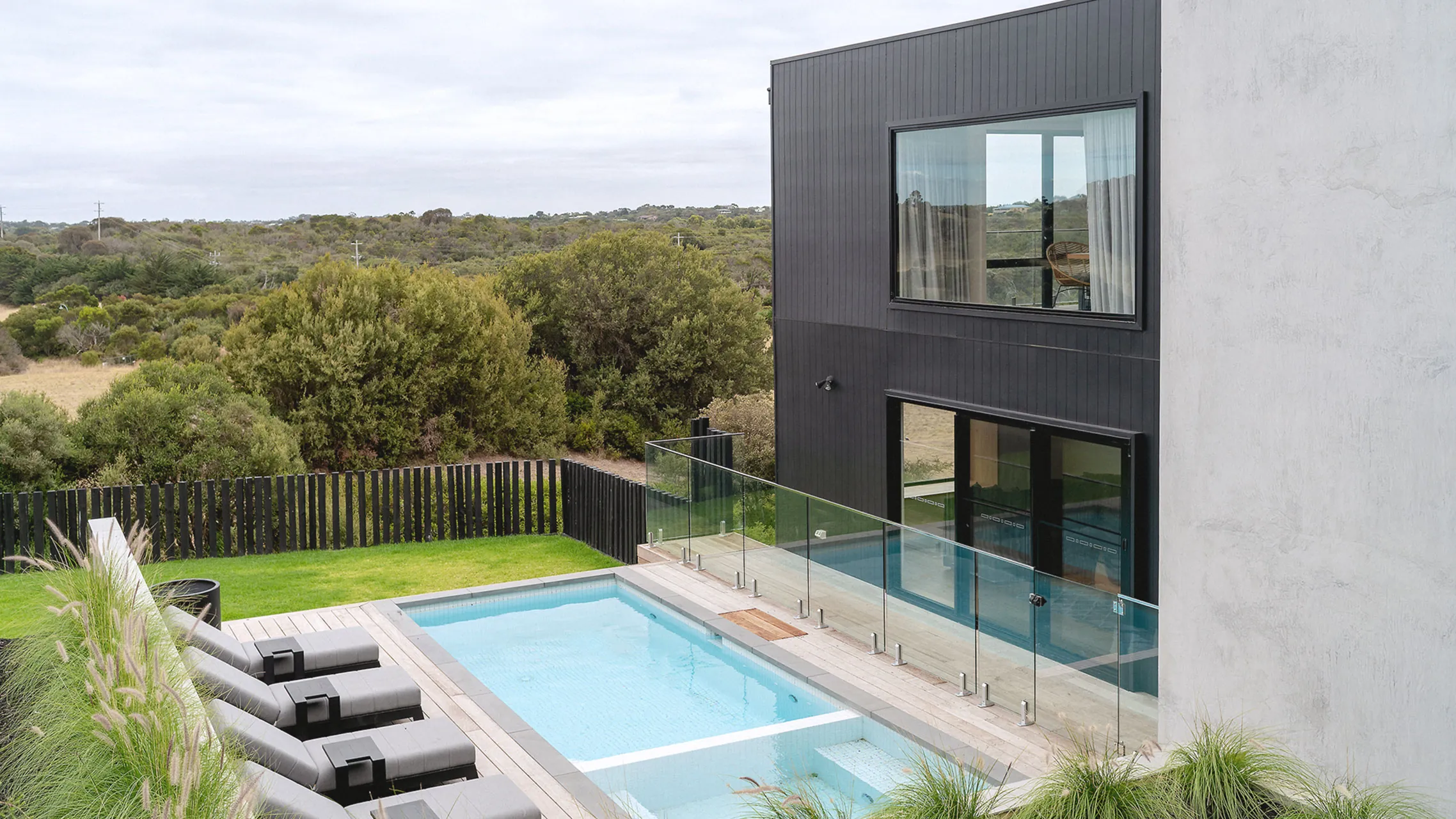 Large Fixed Window and Three Panel Sliding Door