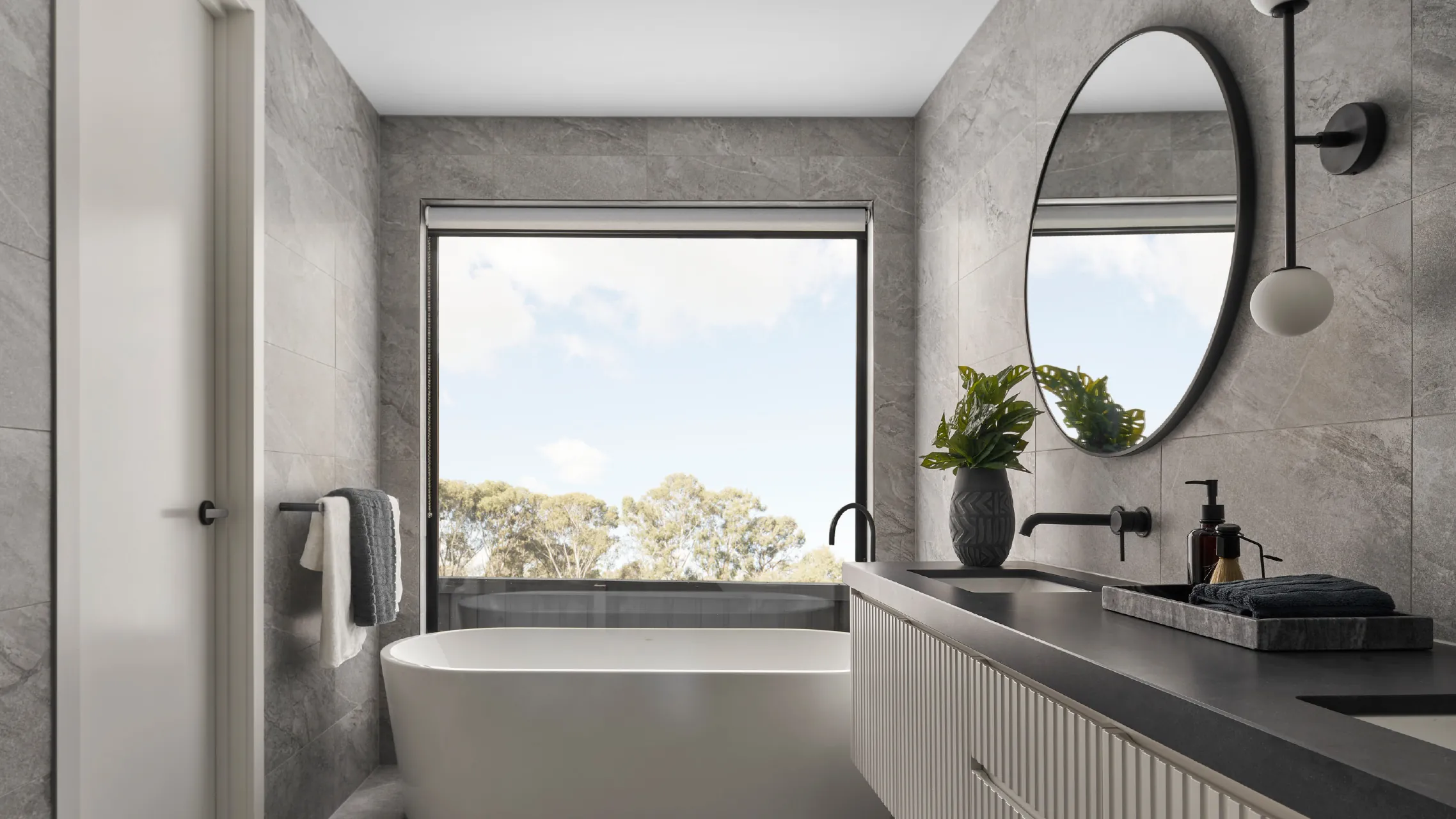 Large Fixed Window next to bathtub